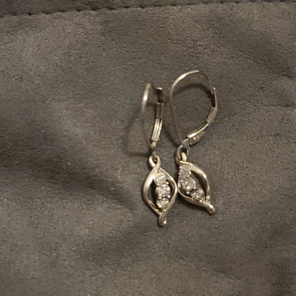 Silver Dangle Earrings with three diamonds.